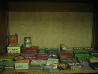 A collection of various vintage tins
