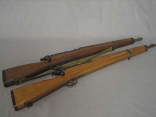 2 1930's/40's childrens bolt action toy rifles, the butts marked Kadet Trainer rifle 