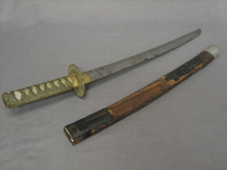 A Japanese Kutana with 16" blade, having a fish skin handle, (scabbard slightly battered)