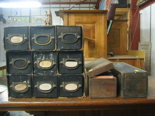 A collection of approx. 600 coloured magic lantern slides contained a 6 drawer table top display cabinet, a 3 drawer table top display cabinet and 2 rectangular wooden boxes with hinged lids