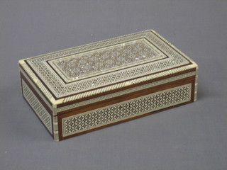 A rectangular Moorish style box with hinged lid 8"