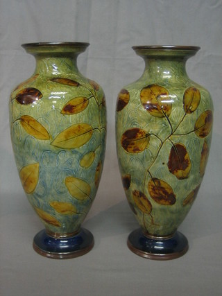 A pair of Royal Doulton  salt glazed baluster shaped vases with leaf decoration, the base marked Royal Doulton 6768 incised 2B 13"
