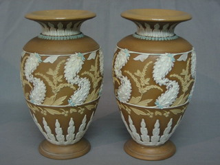 A pair of Doulton Silica vases of club form, bases impressed 0406 9 1/2"