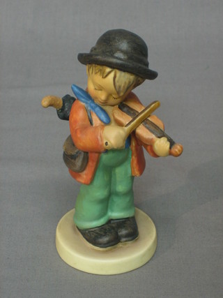 A Goebel figure of standing boy with umbrella playing the violin 5"