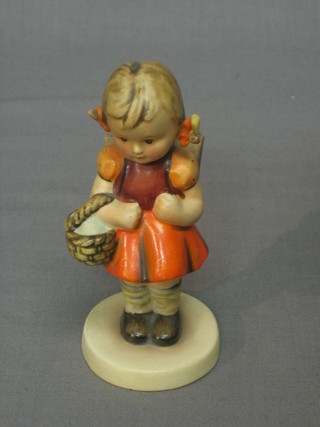 A Goebel figure of standing girl with ruck sack and basket 4"