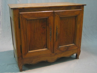 An 18th/19th Century French mahogany cabinet fitted a shelf enclosed by a panelled door 40"