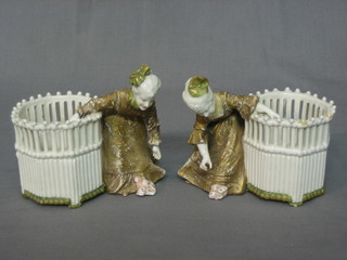 A pair of 19th Century Austrian basket work  spill vases, supported by figures ladies 5"