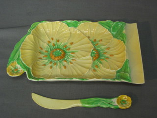 A Carltonware Australian design buttercup pattern dish 7 1/2" and a matching butter knife