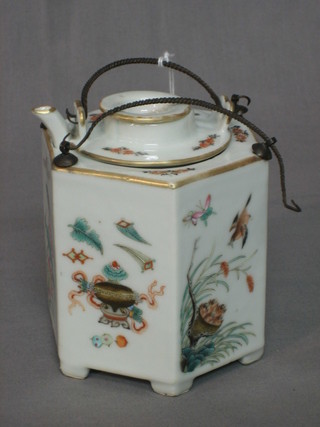 An Oriental 6 sided teapot with floral decoration and wire handle