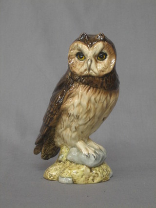 A Doulton model of a short eared owl for White & Mackay Scotts whisky 7"