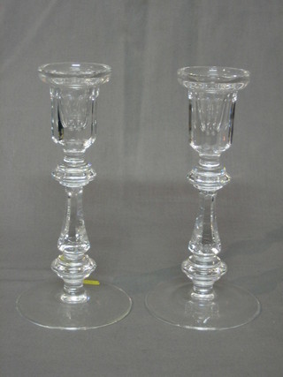 A pair of glass candlesticks with faceted glass sconces 8"
