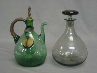 A smoked glass club shaped decanter and stopper 10" and a green glass ewer