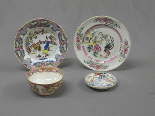 A circular famille vert bowl decorated a courtly figure 9", an Oriental plate decorated a bird 9", a saucer 5" together with an Oriental porcelain bowl decorated figures 6"