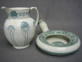 A green and white pottery chamber pot and a green and white pottery jug (chipped)