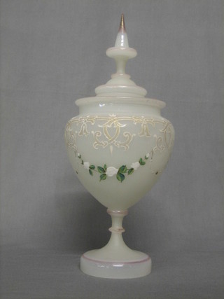 A Bohemian style opaque glass urn and cover with enamelled decoration 14"