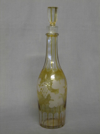 A Bohemian style yellow glass decanter and stopper with vinery decoration 14"