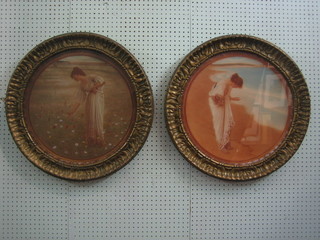 A pair of Edwardian coloured prints of ladies 19" circular, contained in gilt frames