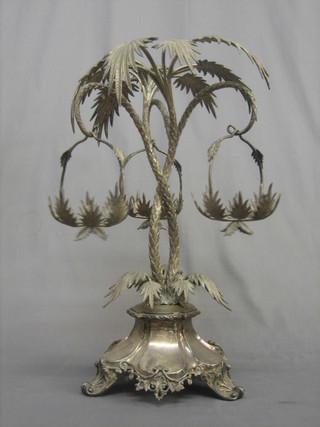 A handsome 19th Century silver plated table centre piece in the form of palm trees hung 3 leaf shaped baskets (no liners), raised on Rococo style panelled supports 21"