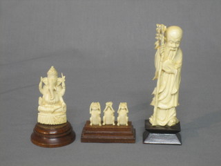 A carved ivory figure of a standing sage 4", an ivory figure of The Elephant God 2" and 1 other of The Three Wise Monkeys