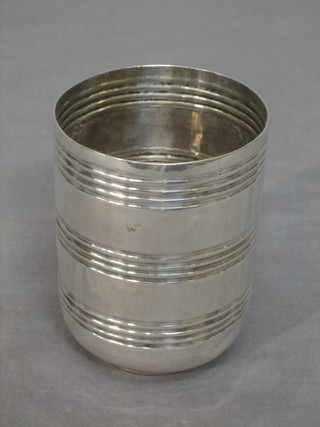 A Georgian style ribbed silver beaker, the base marked DSCG, 2 ozs