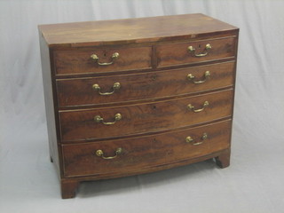 A Georgian mahogany bow front chest of 2 short and 3 long drawers with brass swan neck drop handles, raised on bracket feet 42"