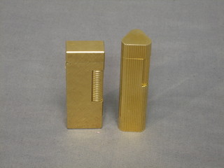 A Dunhill gold plated lighter and a Mauman gold plated lighter