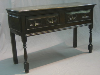 A 17th Century oak dresser base, fitted 2 long drawers raised on turned and block supports 48"