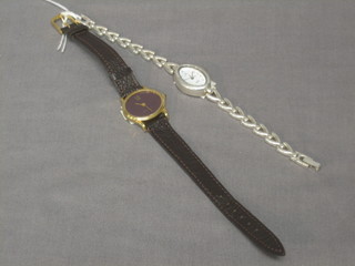 A lady's silver cased cocktail wristwatch and 1 other