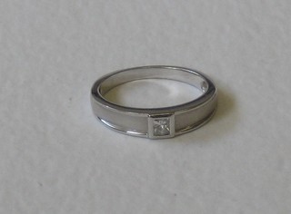 A lady's 15ct white gold dress ring set a square cut diamond