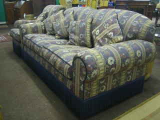 A good quality Victorian style 2 seat settee 79" and matching armchair upholstered in blue and floral patterned material