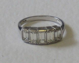 A lady's 18ct white gold dress ring set emerald cut diamonds, approx 1.95ct