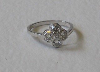 A lady's 18ct gold dress ring set diamonds in the form of a "Club" approx 0.70ct  
