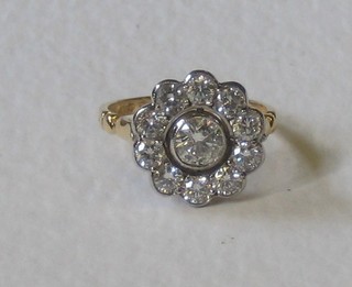 A lady's 18ct yellow gold cluster dress ring set numerous diamonds, approx 1.50ct