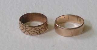A pair of 9ct gold wedding bands