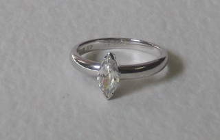 An 18ct white gold dress ring set a marquise shaped white stone