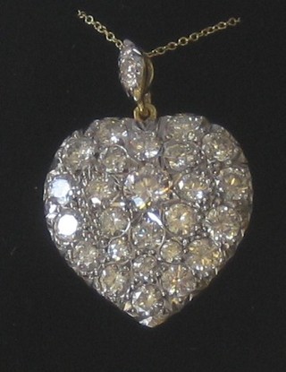 A lady's very attractive heart shaped 18ct gold pendant set numerous diamonds, approx 5.30ct