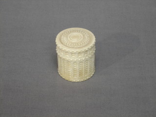 A cylindrical turned ivory trinket box 1 1/2"