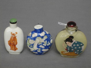 An Oriental glass interior painted snuff bottle decorated a lady with cat 2" and 2 other porcelain snuff bottles