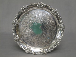 A circular engraved silver plated salver, the border cast grapes 9 1/2"