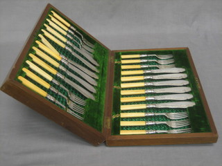 A canteen of 12 silver plated fish knives and forks