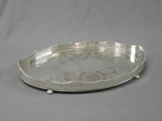 An oval twin handled silver plated tea tray 24"