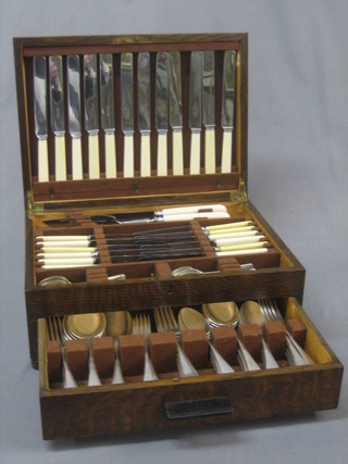 A canteen of silver plated cutlery contained in an oak canteen box