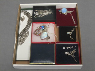 A collection of costume jewellery including silver necklets and pendants