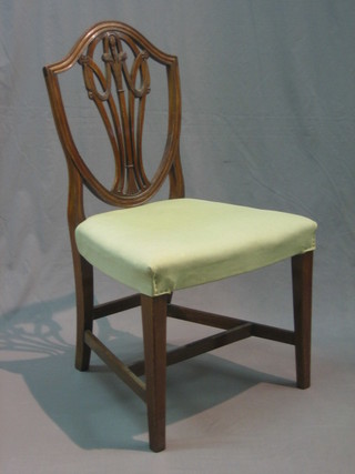 A mahogany Hepplewhite style camel back dining chair with upholstered seat, raised on square tapering supports