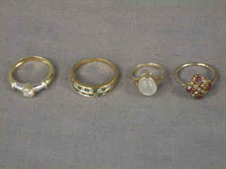 2 gold dress rings and 2 others