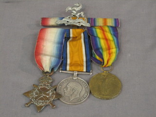 A group of 3 medals to L8303 Pte. F Fox of the Royal West Kent Regt. comprising 1914-15 Star, British War medal and Victory medal, together with a ribbon bar and a Royal West Kent cap badge