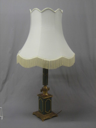 A green and gilt metal table lamp raised on a square base 22"