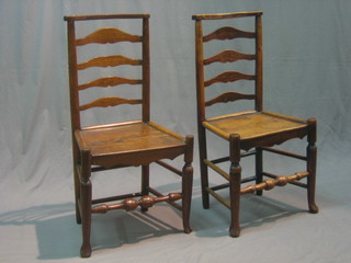 A set of 4 18th/19th Century elm ladderback chair chairs with solid seats, raised on club supports