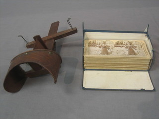 A stereoscopic viewer together with 31 various stereoscopic slides