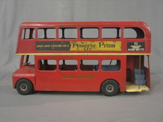 A pressed metal model of a London Transport omnibus 21"